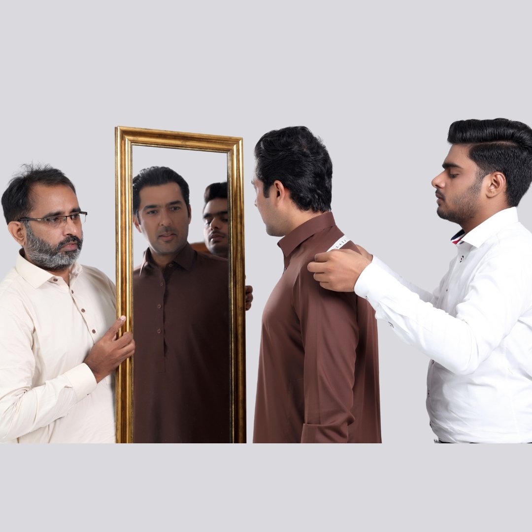 Zaaj tailor taking measurements